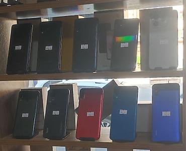 poco: Məhsul: Mobil telefonlar və aksesuarlar vitrini Təsvir: - Vitrində — 2