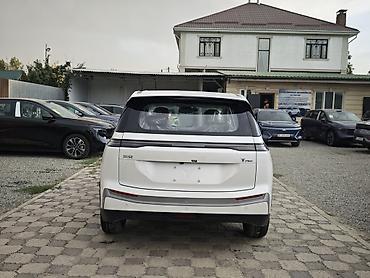 gac aion v plus 2025: GAC Aion Y Plus 510km— полностью электрический кросс‑хэтчбек в белом — 5