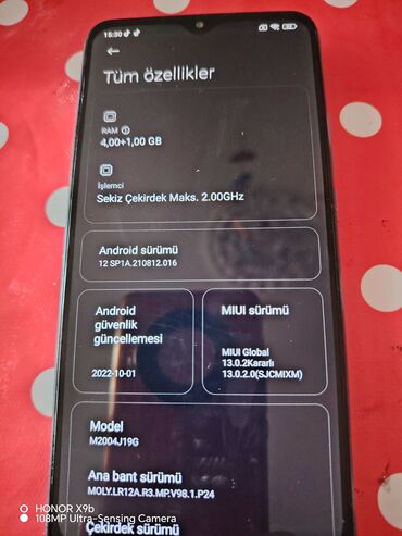 чехол ipad 4: Redmi mobil telefonu parlaq firuzəyi rəngdədir və dördlü kamera