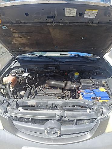 химия на авто: Mazda Tribute: 2001 г., 2 л, Механика, Бензин, Кроссовер — 1