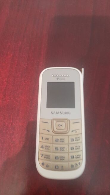 samsung gt s9402 ego: Samsung GT-E1210, rəng - Ağ, İki sim kartlı