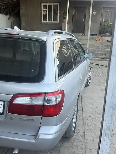 q 7: Mazda 626: 2001 г., 2 л, Механика, Бензин, Универсал — 6