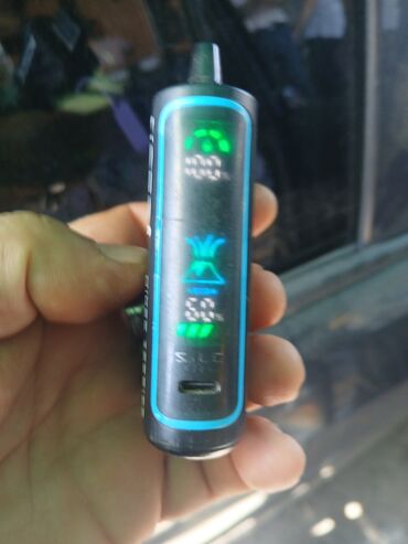 Avtoelektronika: Avtomobil üçün siqaret alışqanına taxılan USB şarj cihazı və Bluetooth
