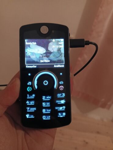 телефон fly power plus 2: Motorola Rokr E8, цвет - Черный
