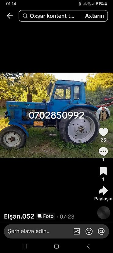 traktor new holland bazar: Mavi rəngli Belarus MTZ tipli təkərli traktor. Xüsusiyyətlər: - Tam — 1