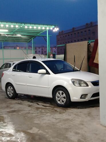 hybrid avtomobillər qiymətləri: Kia Rio: 1.4 л | 2011 г. Седан