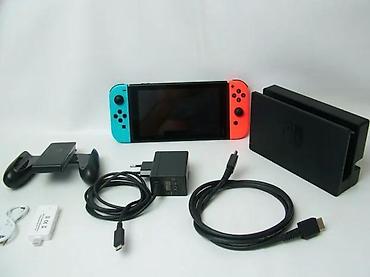 Nintendo Switch: Nintendo Switch V2 konzola u korektnom stanju, sa manjim tragovima — 2