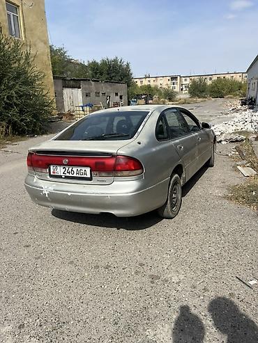 Транспорт: Mazda Cronos: 1993 г., Механика, Бензин, Седан — 2