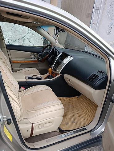 Другие детали салона: Lexus RX 330) — интерьер и оснащение - Рулевое колесо с — 4