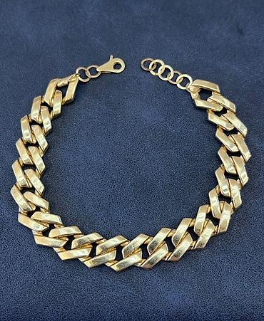 cd qolbaq: Qızıl qolbag 750 əyyarda 10.54 qram cəki qiymət 1999 Azn - Material — 1