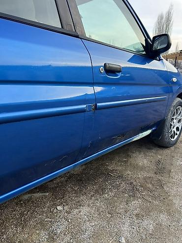 Mazda: Mazda Demio: 1998 г., 1.3 л, Ручные, Бензин, Хэтчбэк — 14