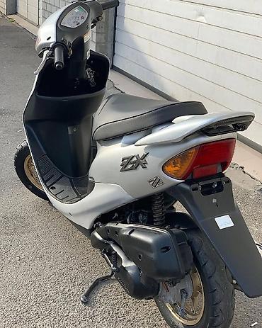 Mopedlər,skuterlər: Satılır: Honda Dio ZX skuter - Ban rəngi: Gümüşü, qara detallarla - — 2