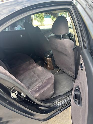 Транспорт: Nissan Primera: 2 л | 2005 г. Седан — 4