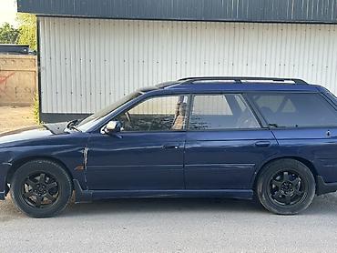 амартизаторы: Subaru Legacy: 1997 г., 2.5 л, Автомат, Бензин, Универсал — 6