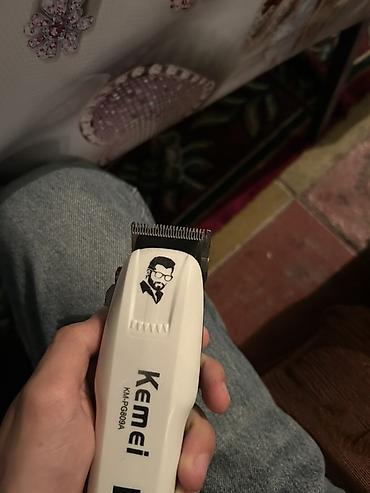pitminutka daşı: Kemei KM-PG809A saç kəsən/traş maşını - Simsiz işləmə: Korpusda LED — 5