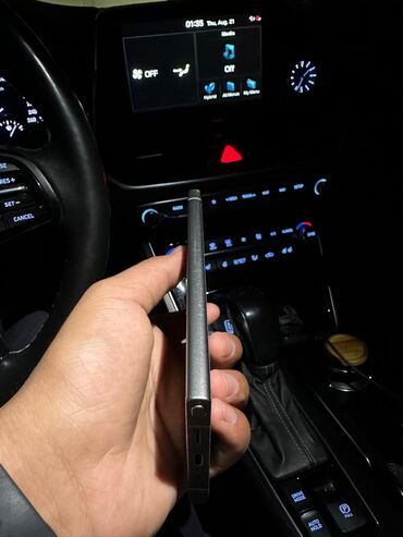 poco m5 pro: Компактный смартфон Unihertz Atom в цвете «серый космос». Устройство