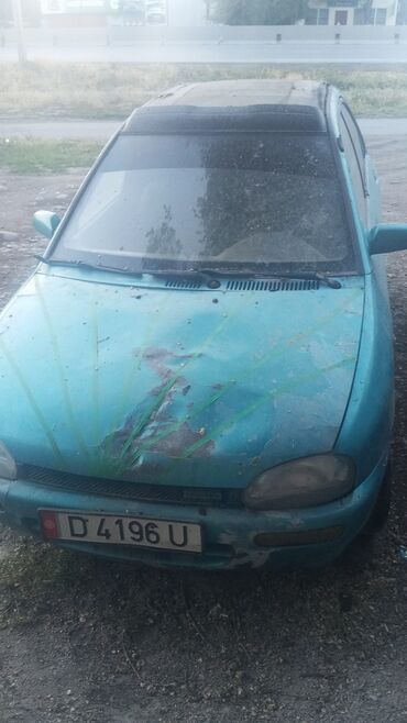 зарядное устройство для электромобиля: Mazda 121: 1991 г., 1.3 л, Механика, Бензин, Кабриолет