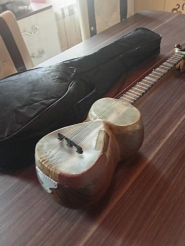 tar cantası: Tar – klassik Azərbaycan musiqi aləti, yumru gövdəli, dəri ilə örtülü — 3