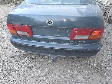 додж стратус: Toyota Carina E: 1997 г., Бензин, Седан — 3