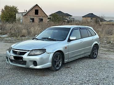 жук жабан: Mazda Familia: 2003 г., 1.6 л, Механика, Бензин, Универсал — 2