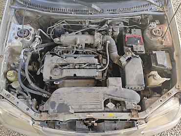 m5 e60 v10: Mazda 323: 2000 г., 1.6 л, Автомат, Бензин, Хэтчбэк — 6