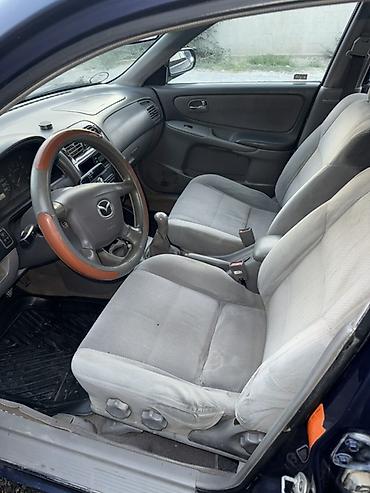 exceed vx: Mazda 626: 2001 г., 1.8 л, Механика, Бензин, Седан — 5