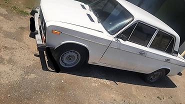 VAZ (LADA): VAZ 2106, ağ rəngli sedan. Texniki xüsusiyyətlər: - Kuzov: sedan — 3