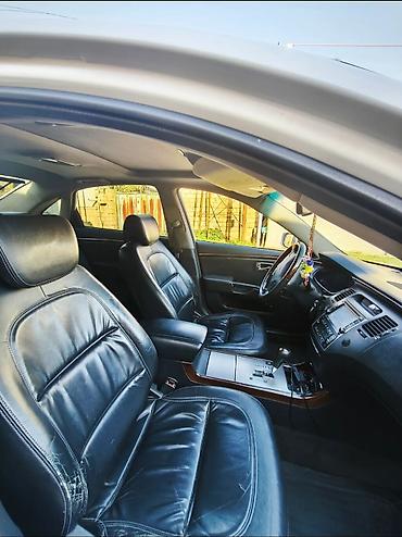 Hyundai: Hyundai Grandeur milvari biznes-sedan. Xüsusiyyətlər və avadanlıq: - — 4