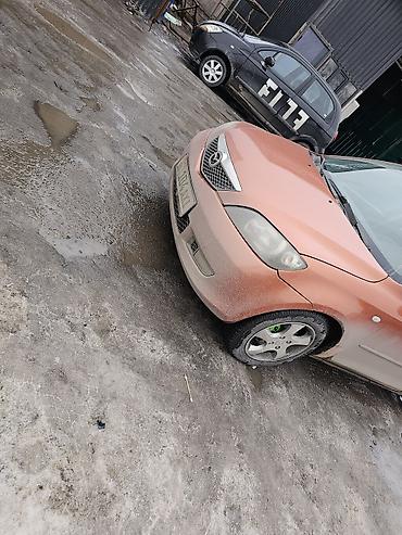 Mazda: Mazda 2: 2003 г., Механика — 13