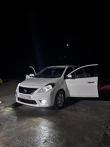 kollektor qutusu: Nissan Sunny: 1.5 l | 2013 il Sedan — 1
