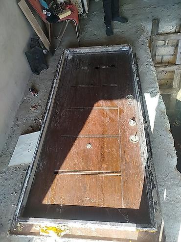 Dəmir karkaslı giriş qapısı – taxta teksturalı ön panel - Material