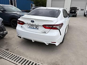 планка: Toyota Camry: 2021 г., Гибрид, Седан — 1
