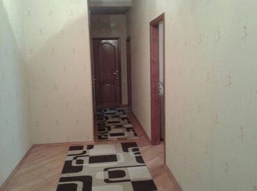 Kommersiya daşınmaz əmlakının satışı: Geniş və işıqlı mənzil interyeri - Geniş dəhliz: Uzun koridor, ağ — 2