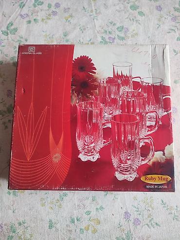 Süfrə ləvazimatları: Klassik stolüstü dəst – gümüşü rəngli süfrə ləvazimatları və şüşə — 2