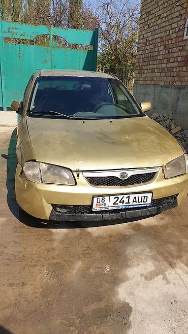 шит приборы: Mazda 323: 1998 г., 1.6 л, Механика, Бензин, Седан — 2
