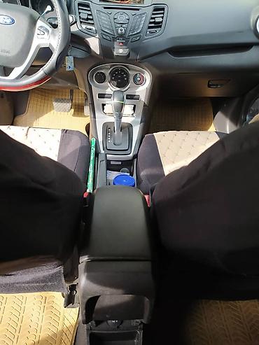 корса: Ford Fiesta: 2016 г., 1.6 л, Автомат, Гибрид, Седан — 2