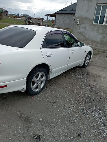 знаки: Mazda Capella: 2003 г., 2.5 л, Автомат, Бензин, Седан — 3