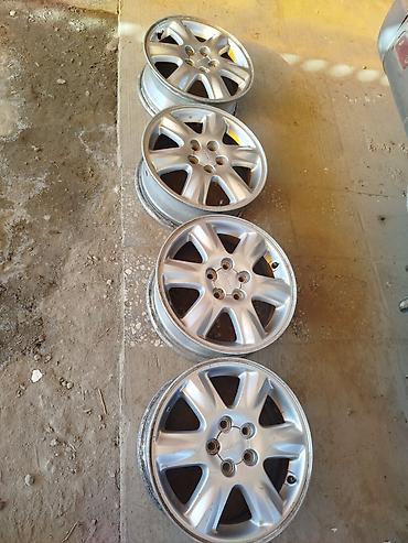 drive: Комплект из 4 оригинальных литых дисков Subaru. - Диаметр: 15" - — 1