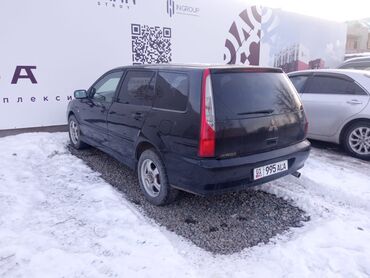 Mitsubishi: Mitsubishi Lancer: 2003 г., 2 л, Механика, Бензин, Универсал — 1