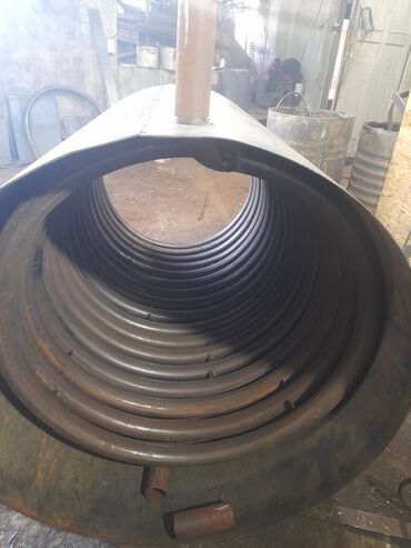 Котлы: Твердотопливный водогрейный котёл с варочной поверхностью Описание: - — 10