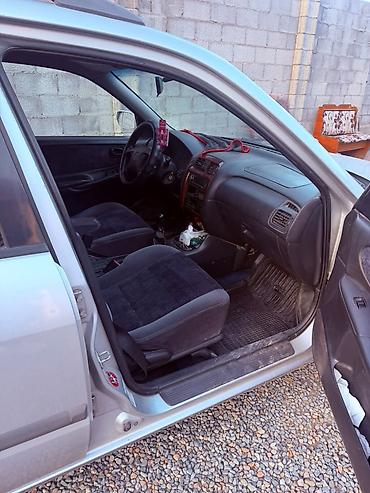 mazda 626 2001: Mazda 626: 1999 г., 2 л, Механика, Бензин, Универсал — 6