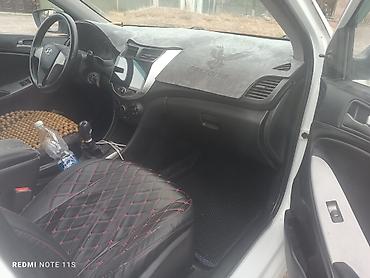 Унаа: Hyundai Solaris: 2015 г., 1.4 л, Кол менен иштөөчү, Бензин, Седан — 9