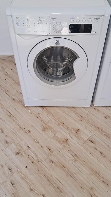 ventilyator su ile: Indesit önyükləməli paltaryuyan maşın - Yük həcmi: 7 kq - Enerji — 1