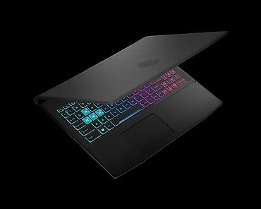 genius ses sistemi: MSI oyun noutbuku – zərif mat qara korpus, əyilməz xətlər və loqo ilə — 3