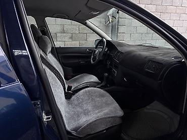 авто вариянт: Volkswagen Golf: 1999 г., 1.6 л, Механика, Универсал — 4