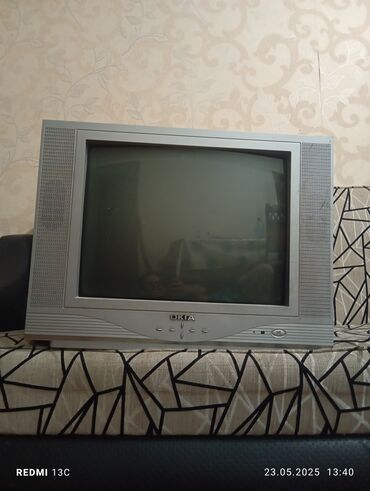 Televizorlar: Televizor, ishlek veziyyetdedi. Tv Okia markasidir, Memar ecemide