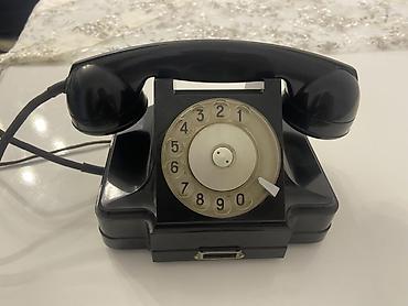 Stasionar telefonlar: Məhsul: Mexaniki diskli retro masa telefonu Təsvir: - Korpus: Qara — 1