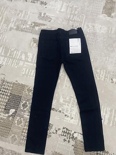 Узкие джинсы (slim fit ) черного цвета.от бренда purple -