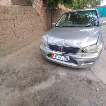 Mitsubishi: Mitsubishi Lancer: 2001 г., Седан