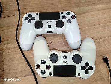 oyun direksiyonu: PlayStation 4 Pro oyun konsolu. Əla vəziyyətdə, 2 orijinal pultla - — 3